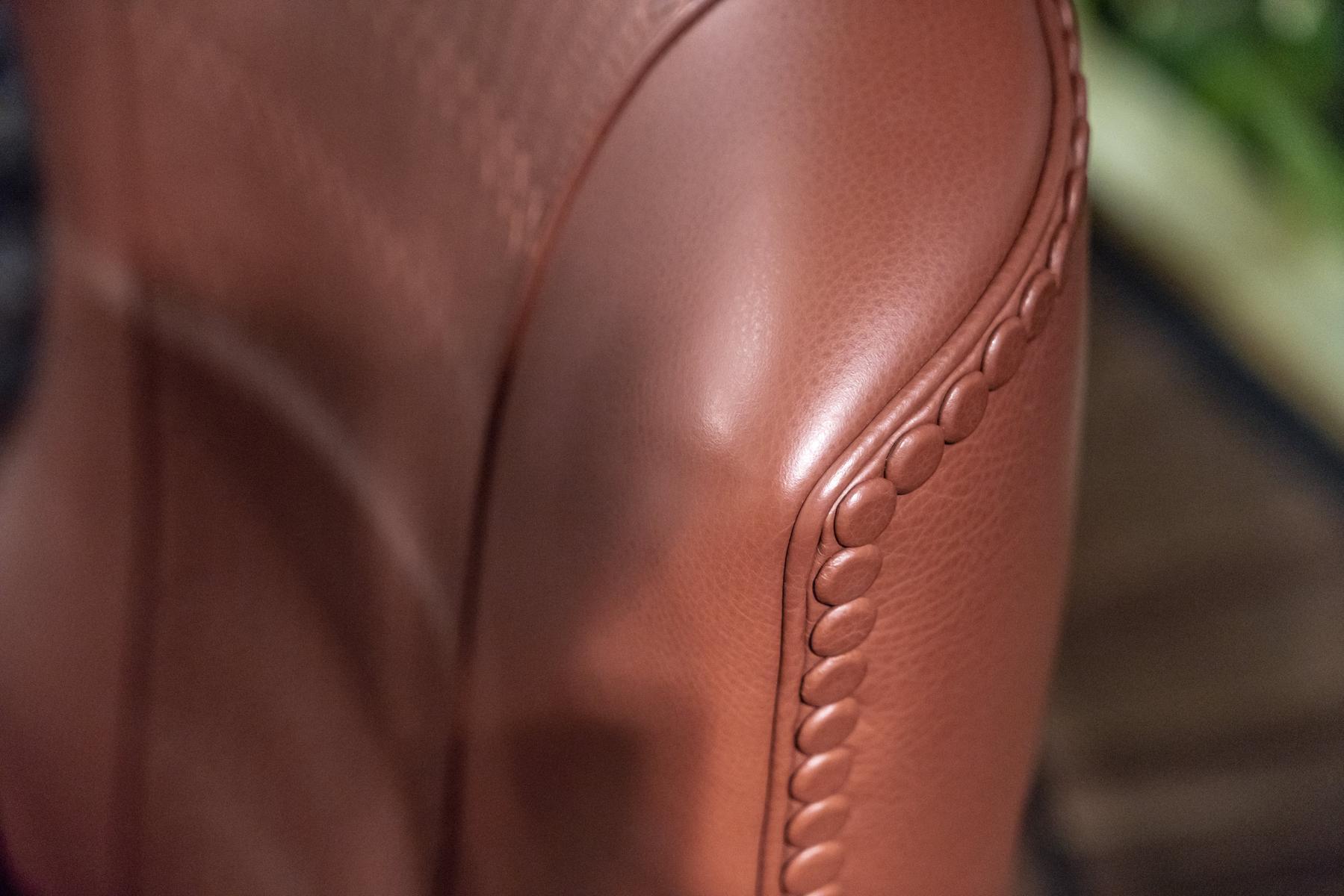 Upholstered leather chair with armrests | Diletta by Bruno Zampa