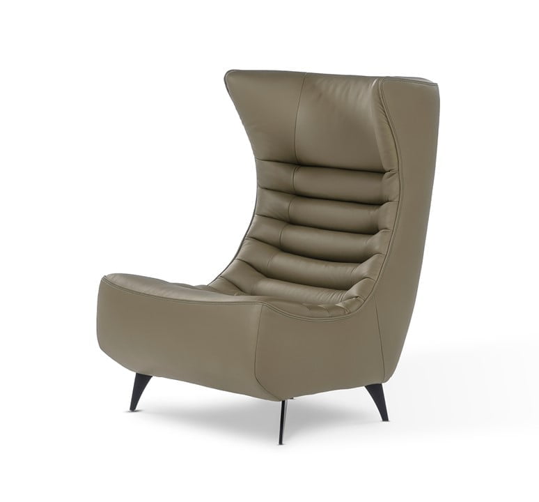 The 'Gerrit' armchair is a comfortable, modern classic with quilting detail that extends to a matching footstool. Optional swivel base and customizable finishes cater to personal or office use. | Gerrit by Calia Italia