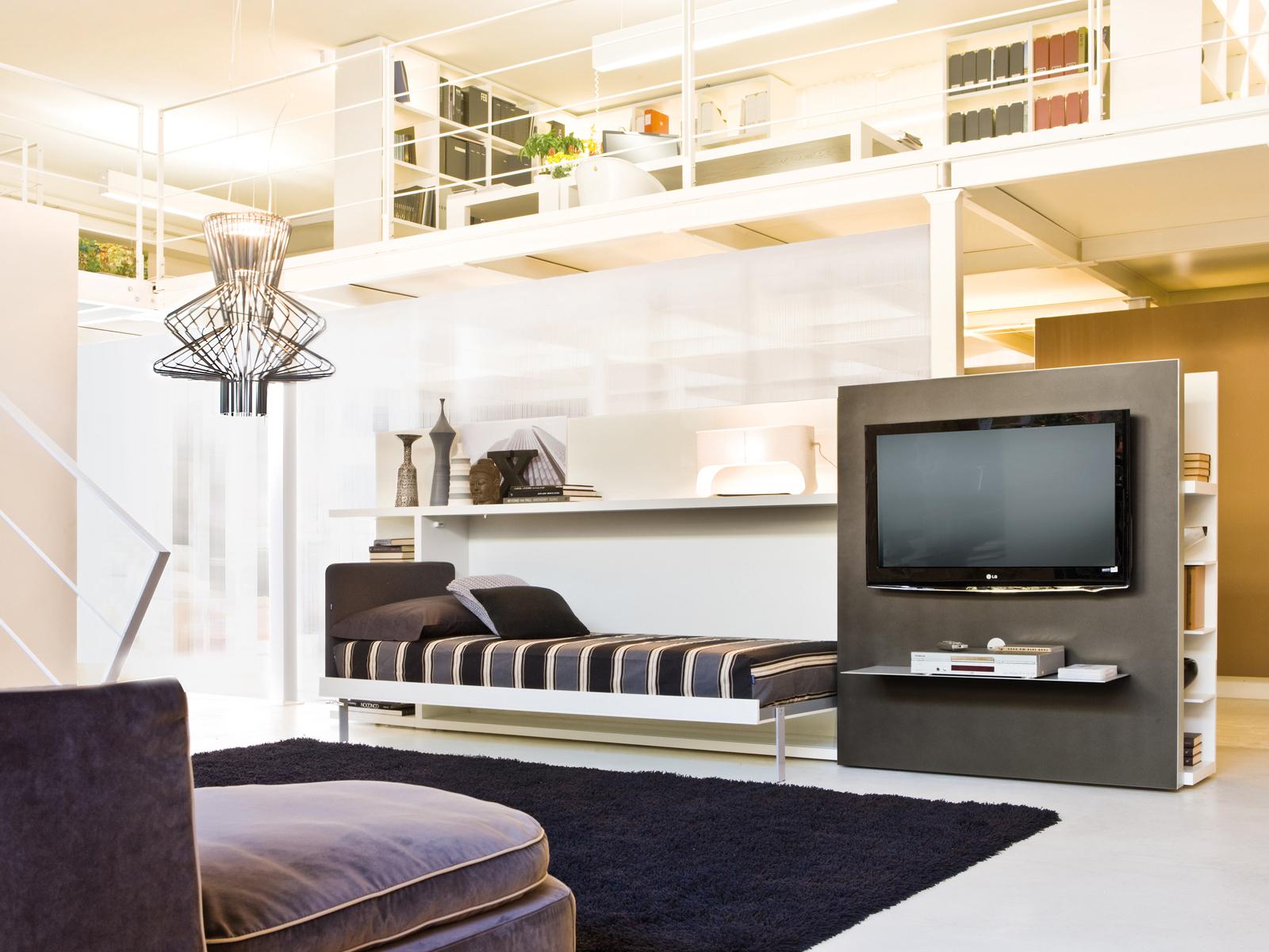 Freestanding wooden storage wall with fold-away bed | Poppi Theatre by CLEI