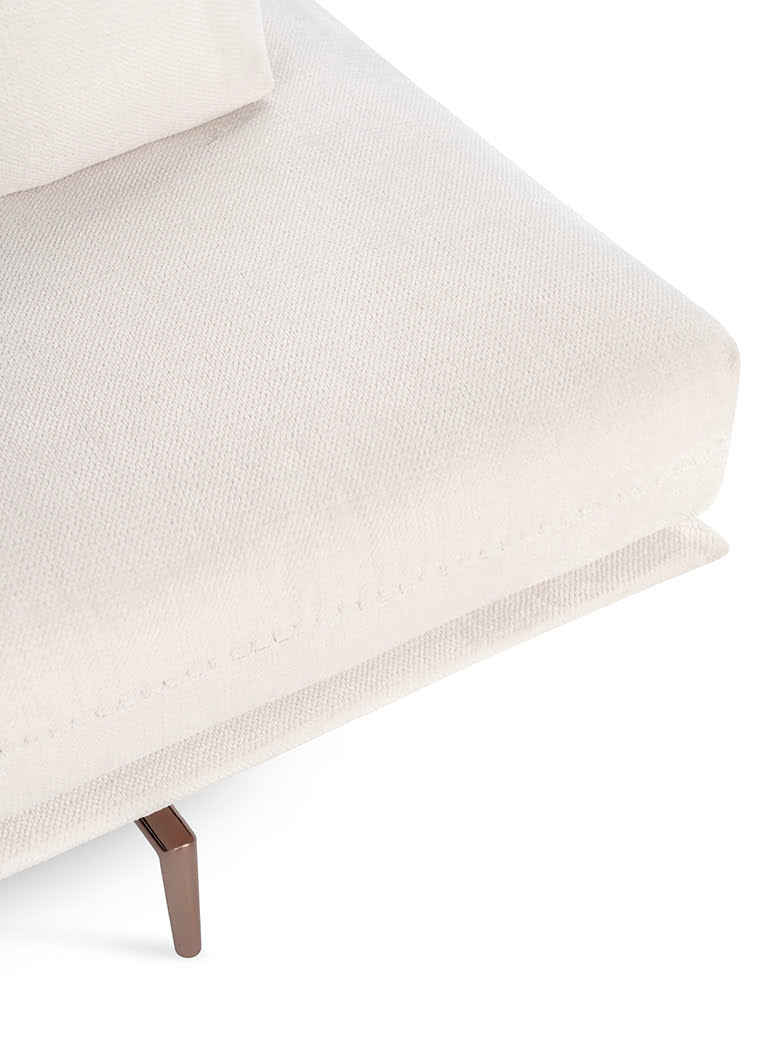 A versatile sofa offering adjustable backrests for multiple seating positions, elegant design stitching, and optional integrated table surfaces, elevated by stylish metal feet. | Gianduiotto by Calia Italia