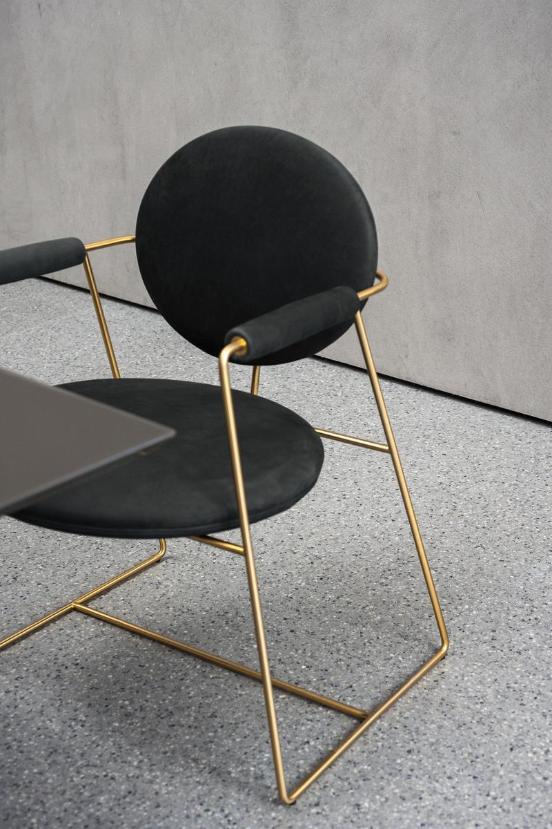 Upholstered leather chair with armrests | Gemma by Baxter