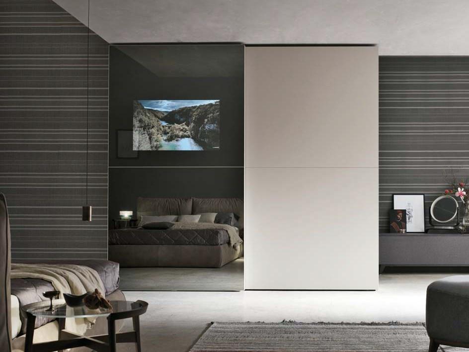 Sectional wardrobe with sliding doors with built-in TV | Vision by Tomasella