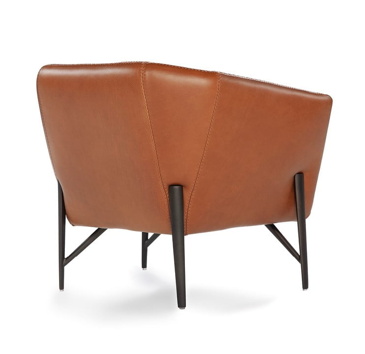 Contemporary armchair with a slim, enveloping structure and soft cushion for comfort, ideal for space efficiency without compromising on style. | Venere by Calia Italia