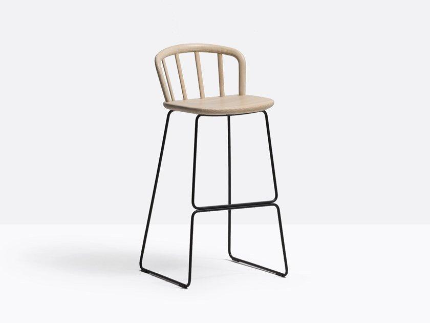High sled base ash stool with footrest | Nym 2859 by Pedrali