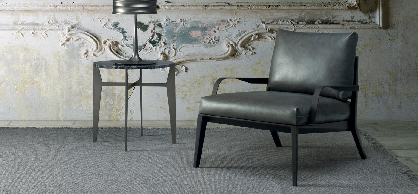 Leather easy chair with armrests | Viaggio by Natuzzi Italia