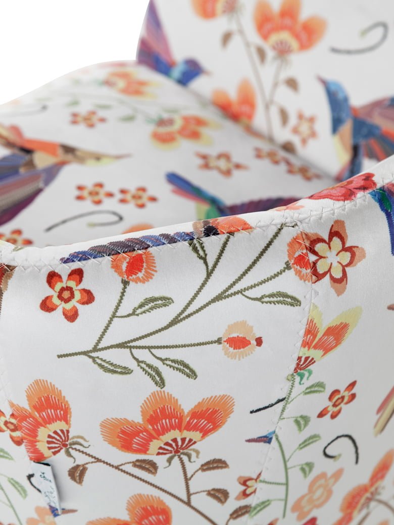 Elegant Mater Familias armchair with a layered seat offers enchanting comfort and a unique, sophisticated design suitable for family use. | Mater Familias by Calia Italia