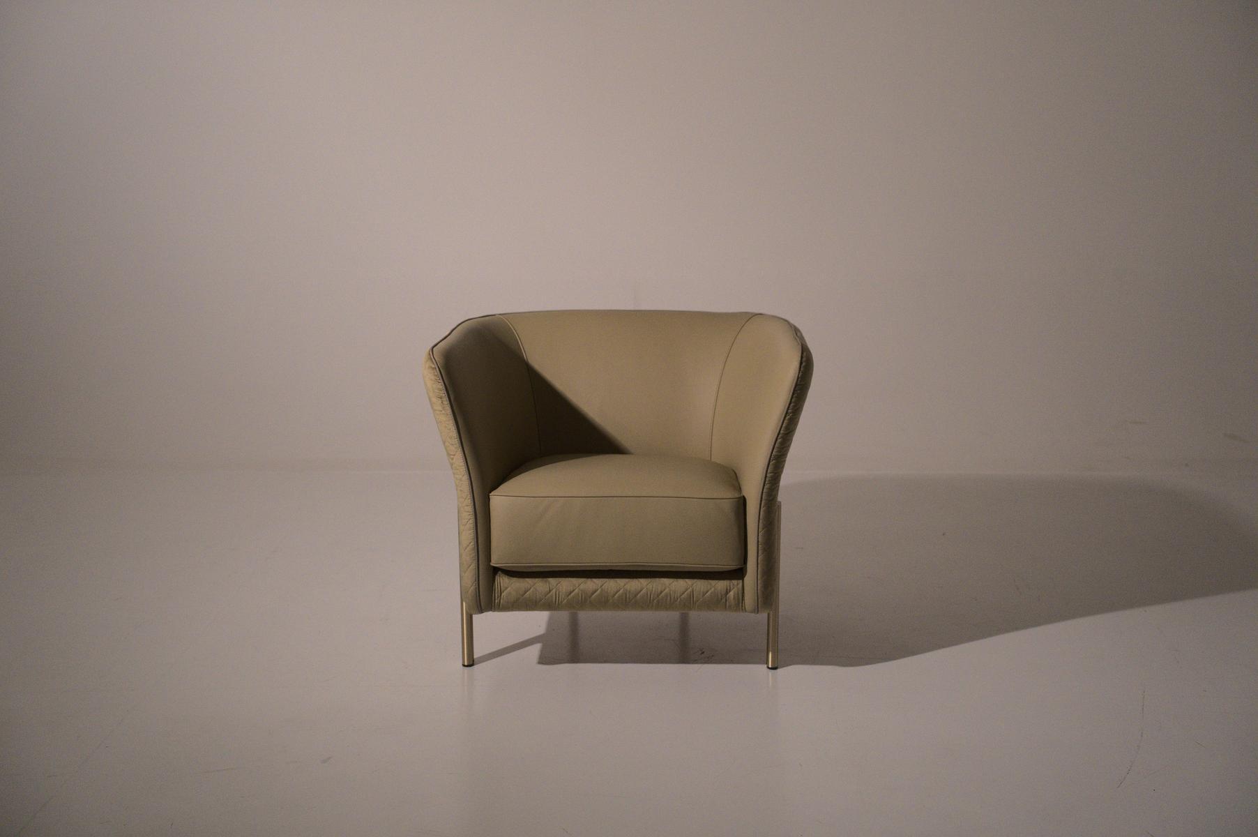 Fabric armchair with armrests | Universal by Mantellassi 1926