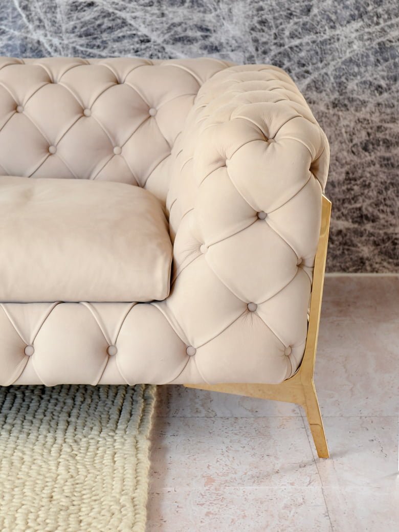 Elegantly crafted Belle Epoque sofa with capitonné workmanship for luxurious comfort and sophisticated modern feet design, perfect for conversational and stylish lounging. | Belle Epoque by Calia Italia