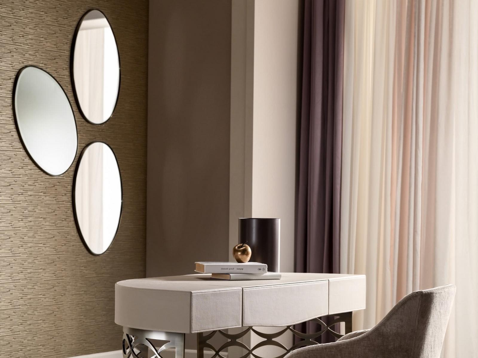 Oval wall-mounted framed iron mirror | Stone by Cantori