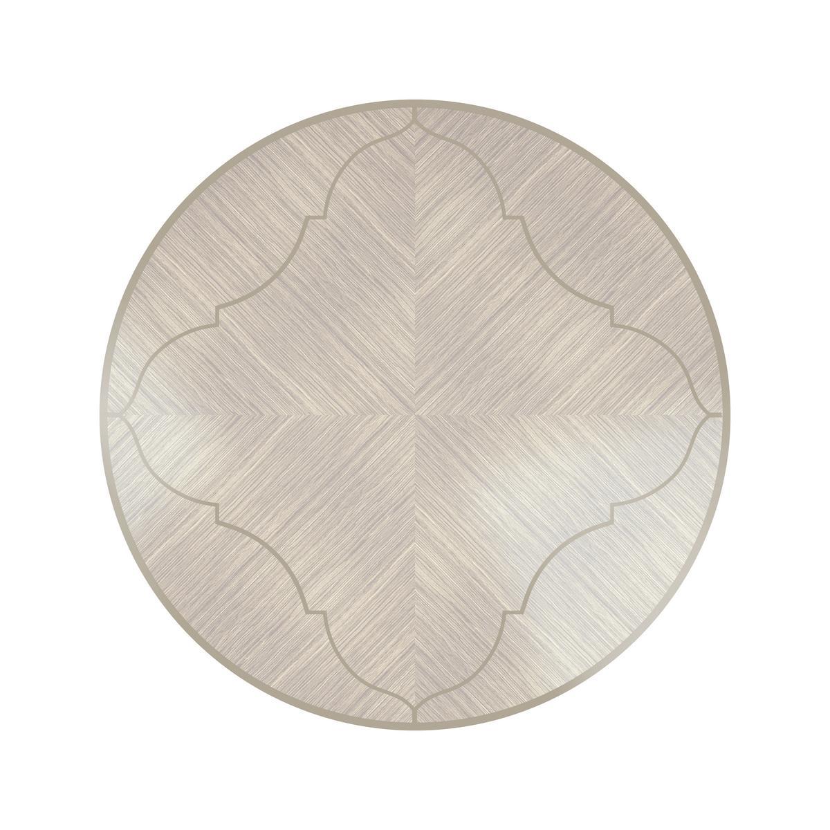 Round walnut table | Metropolis by Bruno Zampa