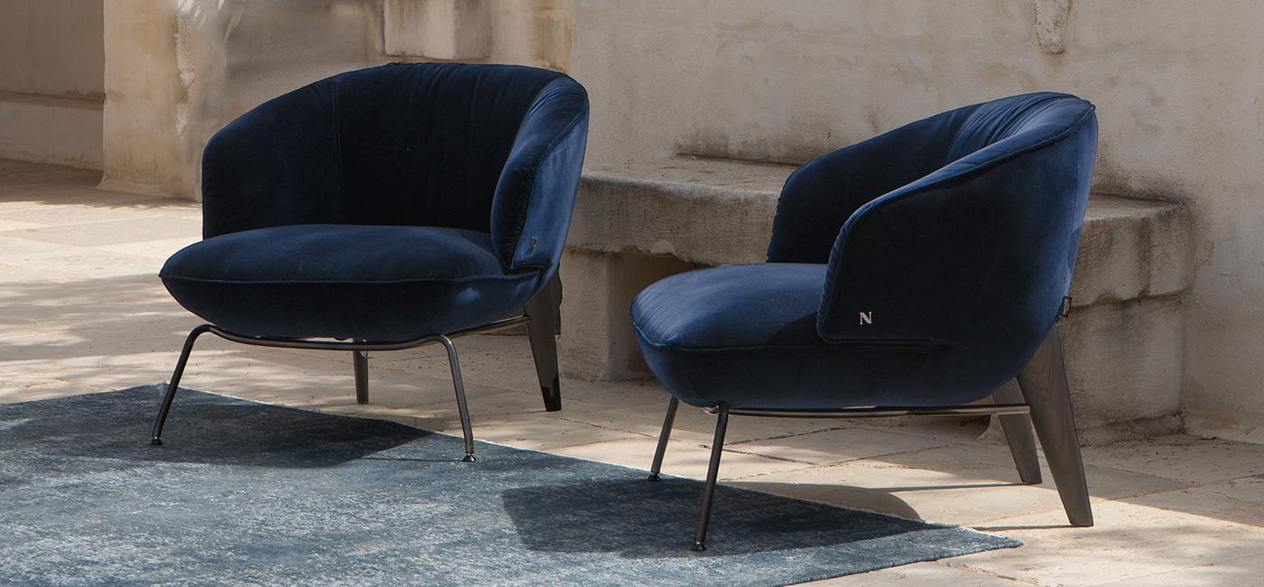 Fabric easy chair with armrests | Penelope by Natuzzi Italia