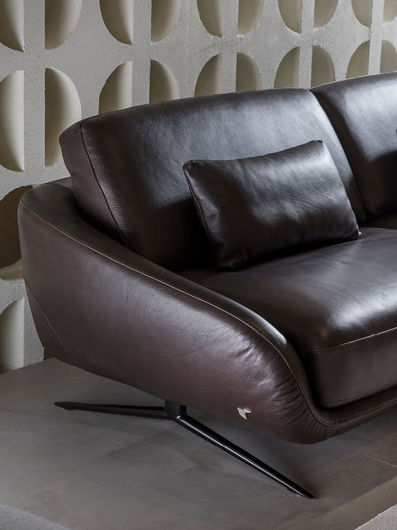 The 'Regal_e' is a versatile, modular sofa with adjustable backrests and electric leg-rests for high comfort, suitable for spacious interiors, and offers various upholstery and finish options. | Regal_e by Calia Italia