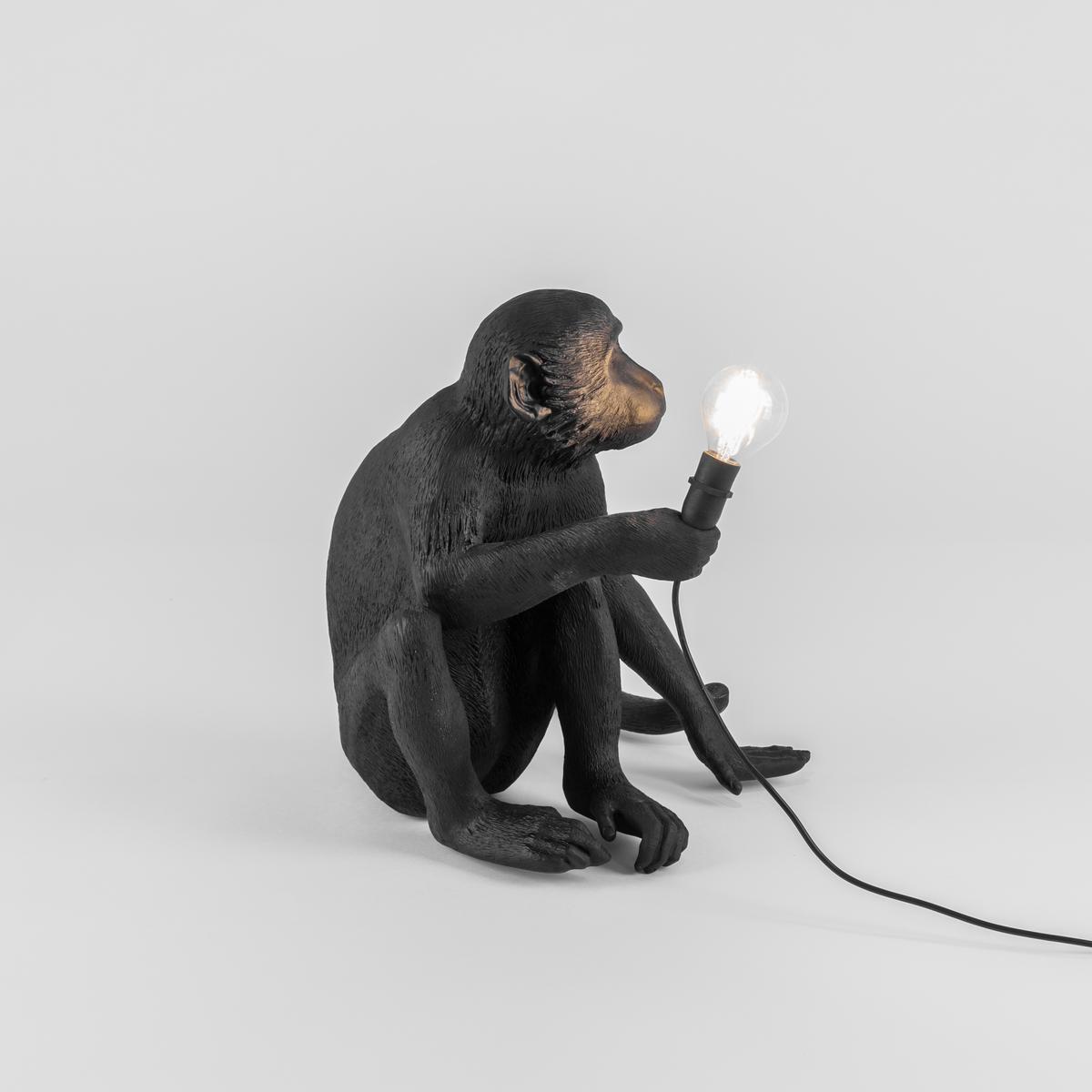 LED resin floor lamp | The Monkey Lamp Black Sitting by Seletti