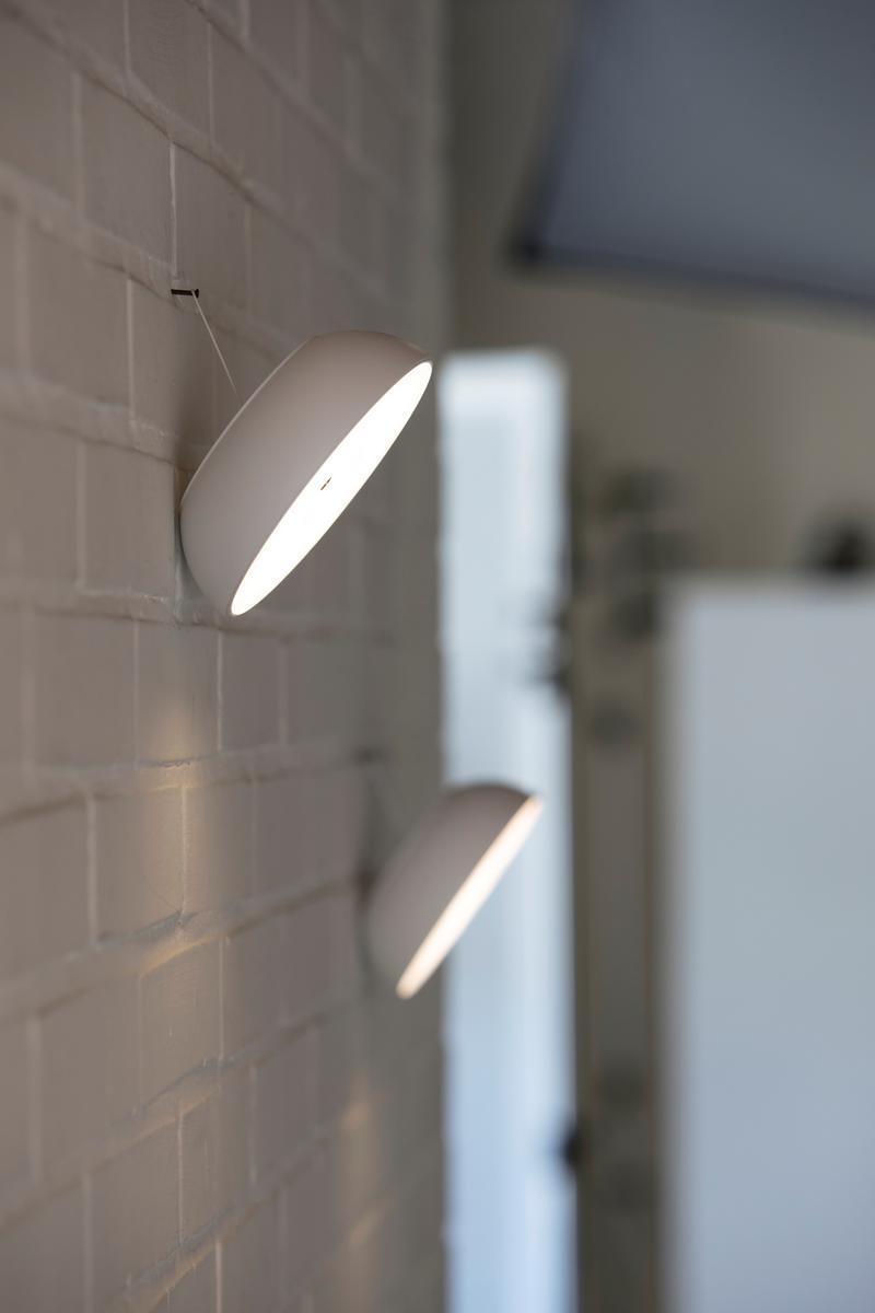 Multifunctional portable wall lamp | Float by Axolight