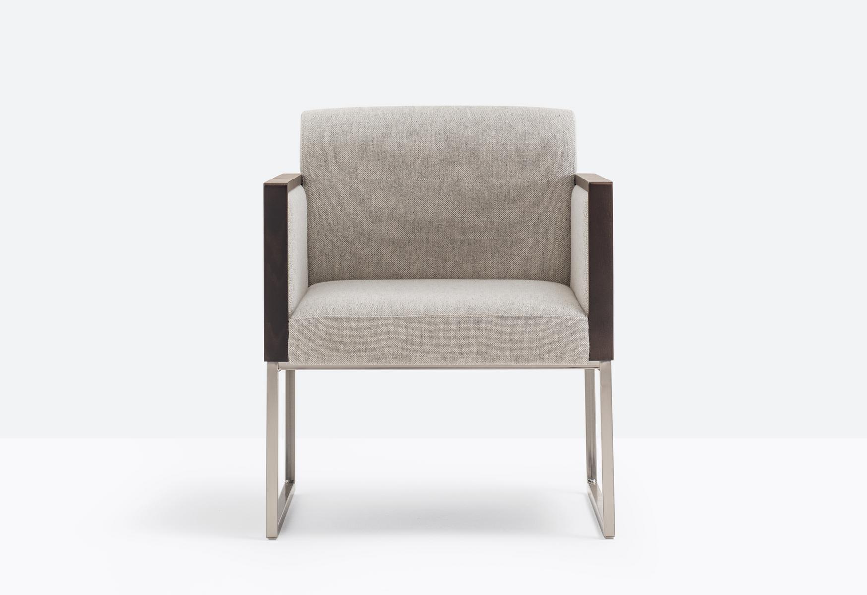 Sled base upholstered easy chair with armrests | Box 741 by Pedrali