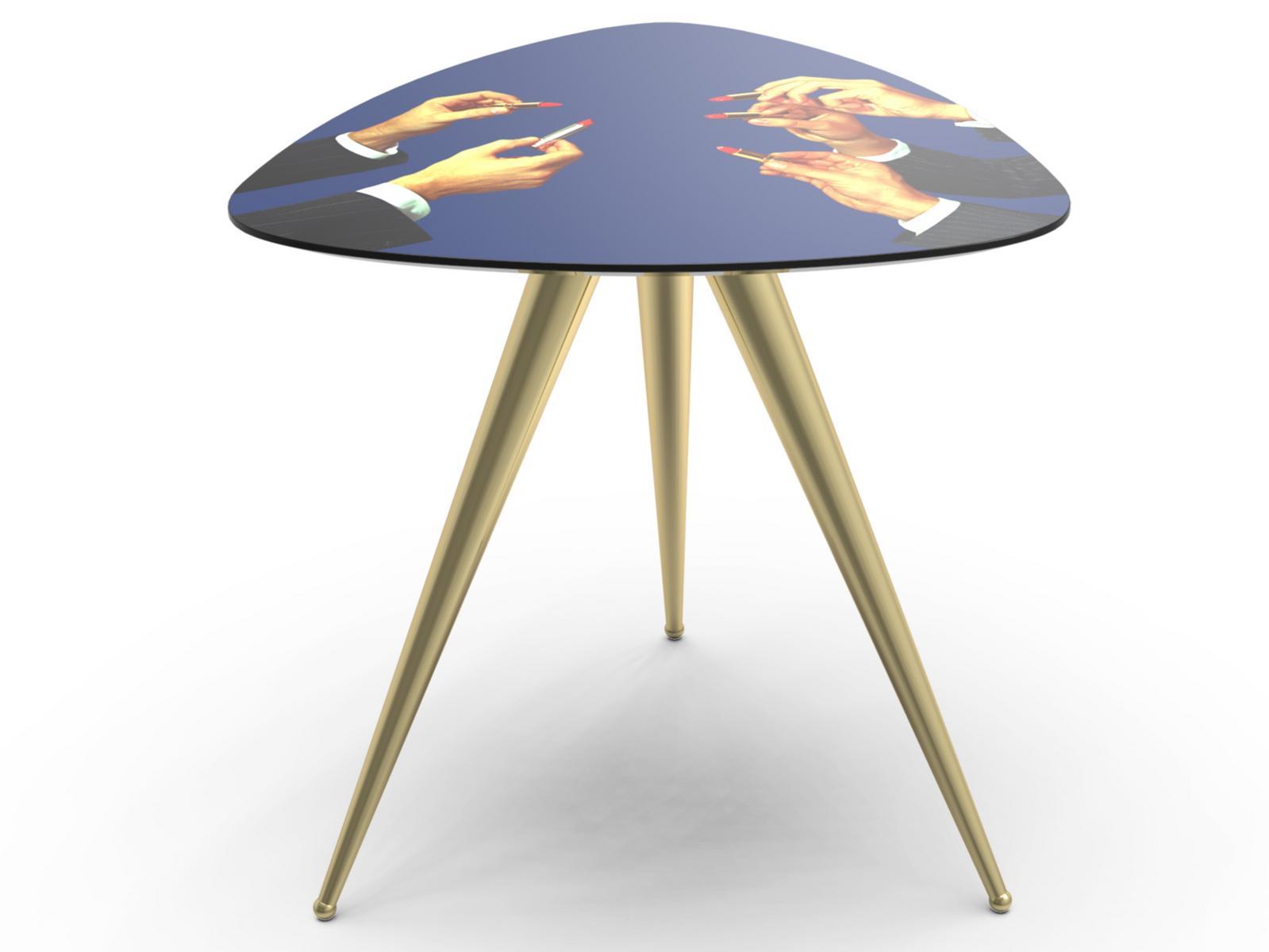 Triangular coffee table with MDF top and metal legs | Lipsticks by Seletti