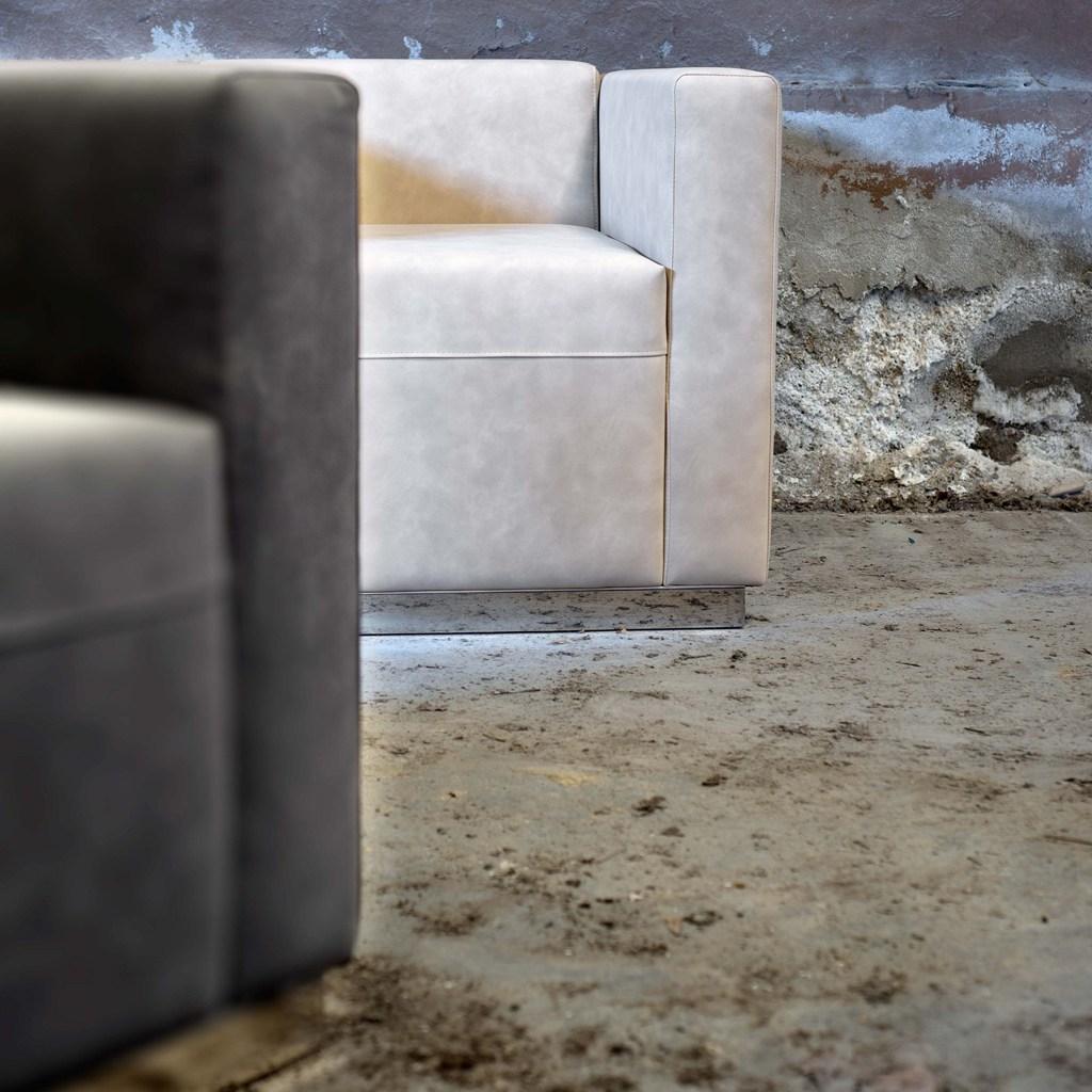 Upholstered leather armchair with armrests | Quincy by Domingo salotti