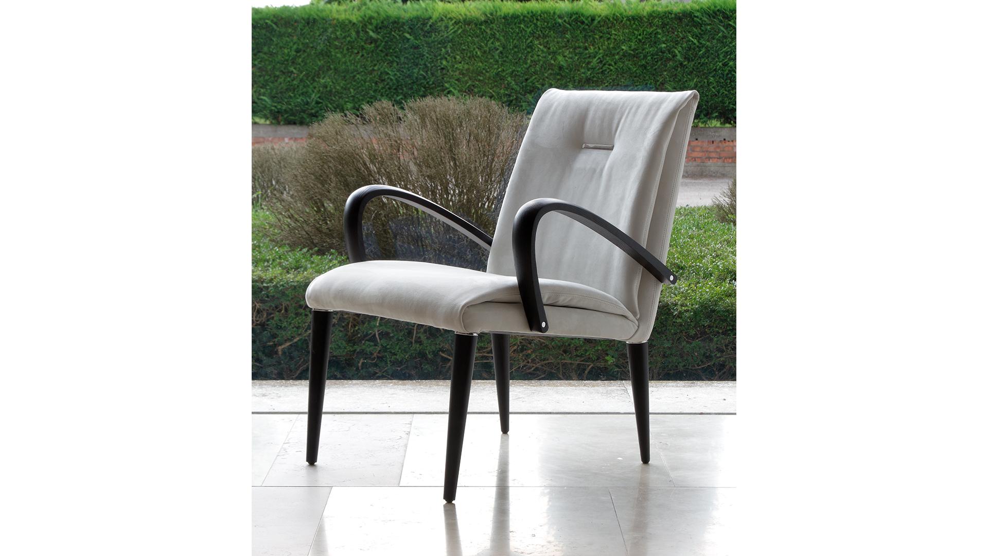 Upholstered leather easy chair with armrests | Soft by Reflex