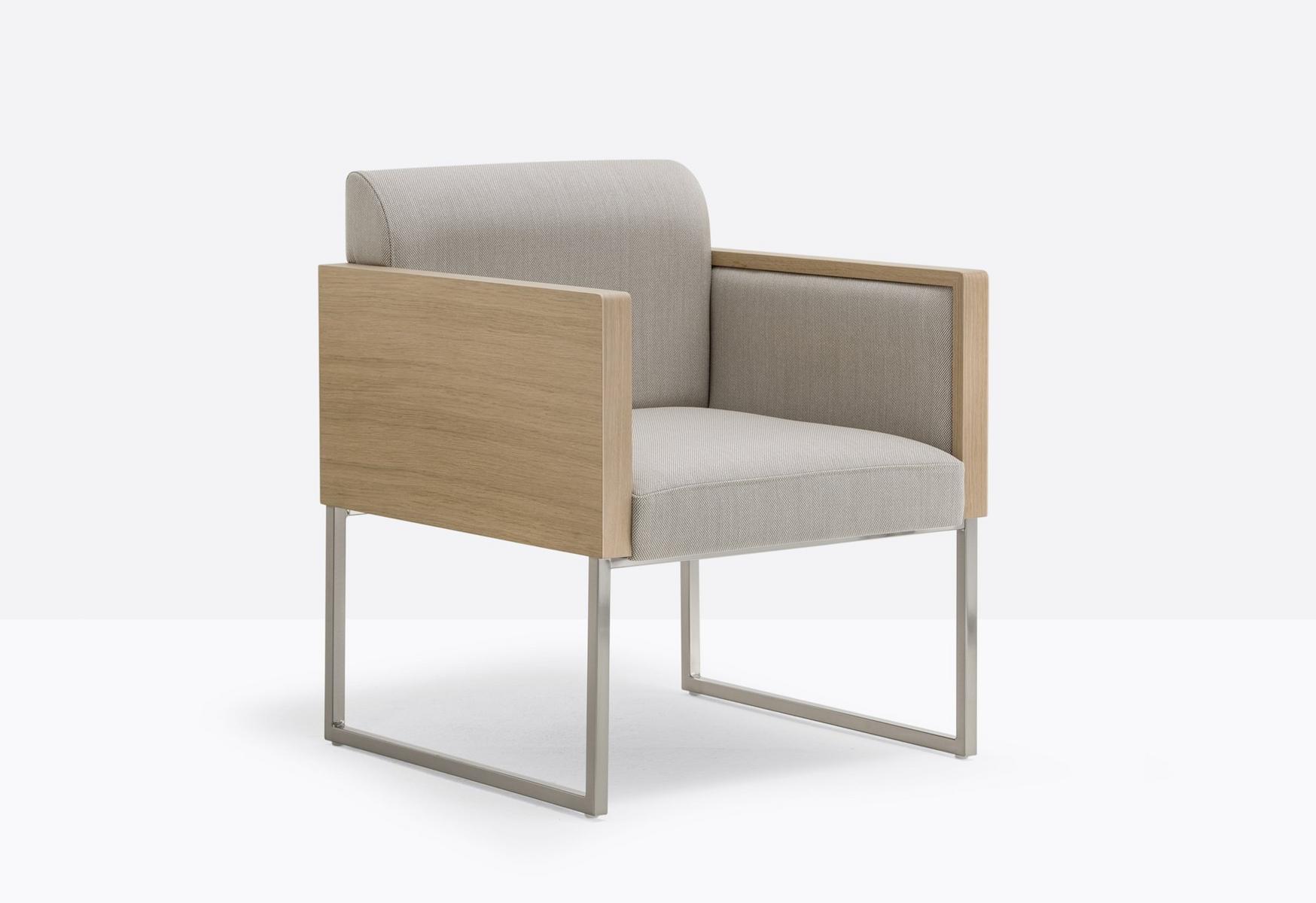 Sled base upholstered easy chair with armrests | Box 741 by Pedrali