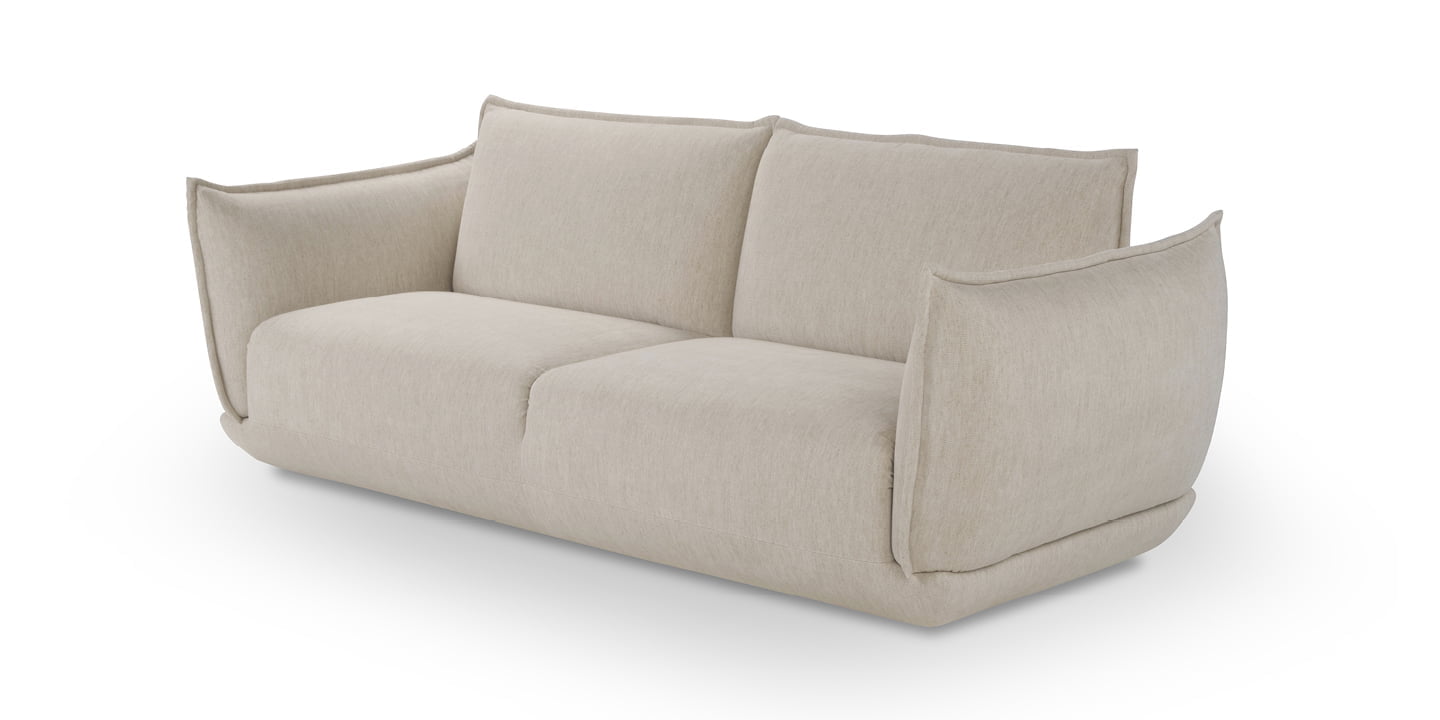 The Éclair sofa features an innovative design with sculptural volumes, decorative stitching, and comfortable seating, available in various sizes for modern and attractive interiors. | L'Eclair by Calia Italia