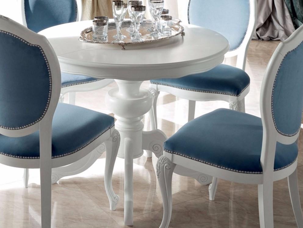 Round coffee table with 4-star base | 13147 by Modenese Gastone