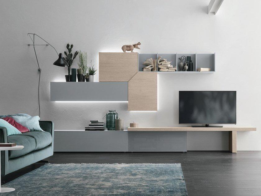 Sectional storage wall with integrated lighting | Unit A110 by Tomasella