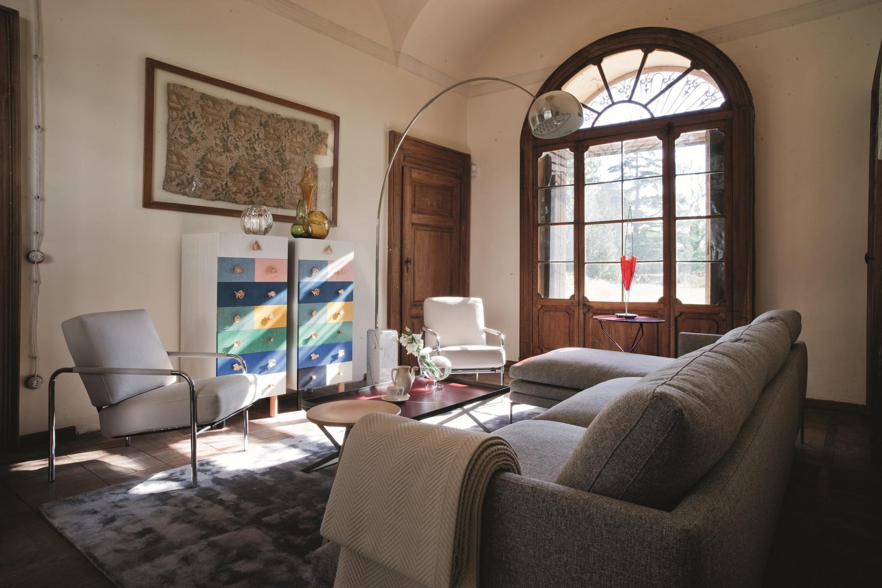 Upholstered easy chair with armrests | Susanna by Zanotta