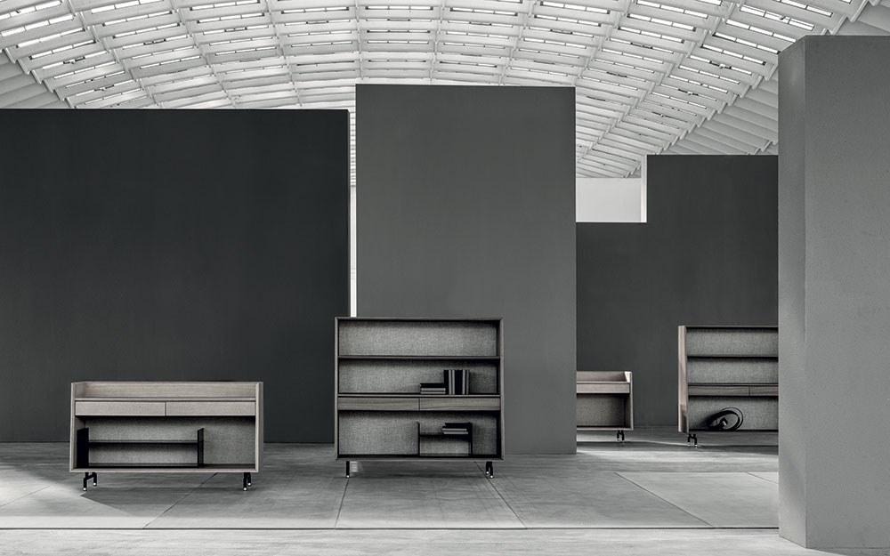 Freestanding walnut and fabric bookcase with drawers | Analog by Frigerio