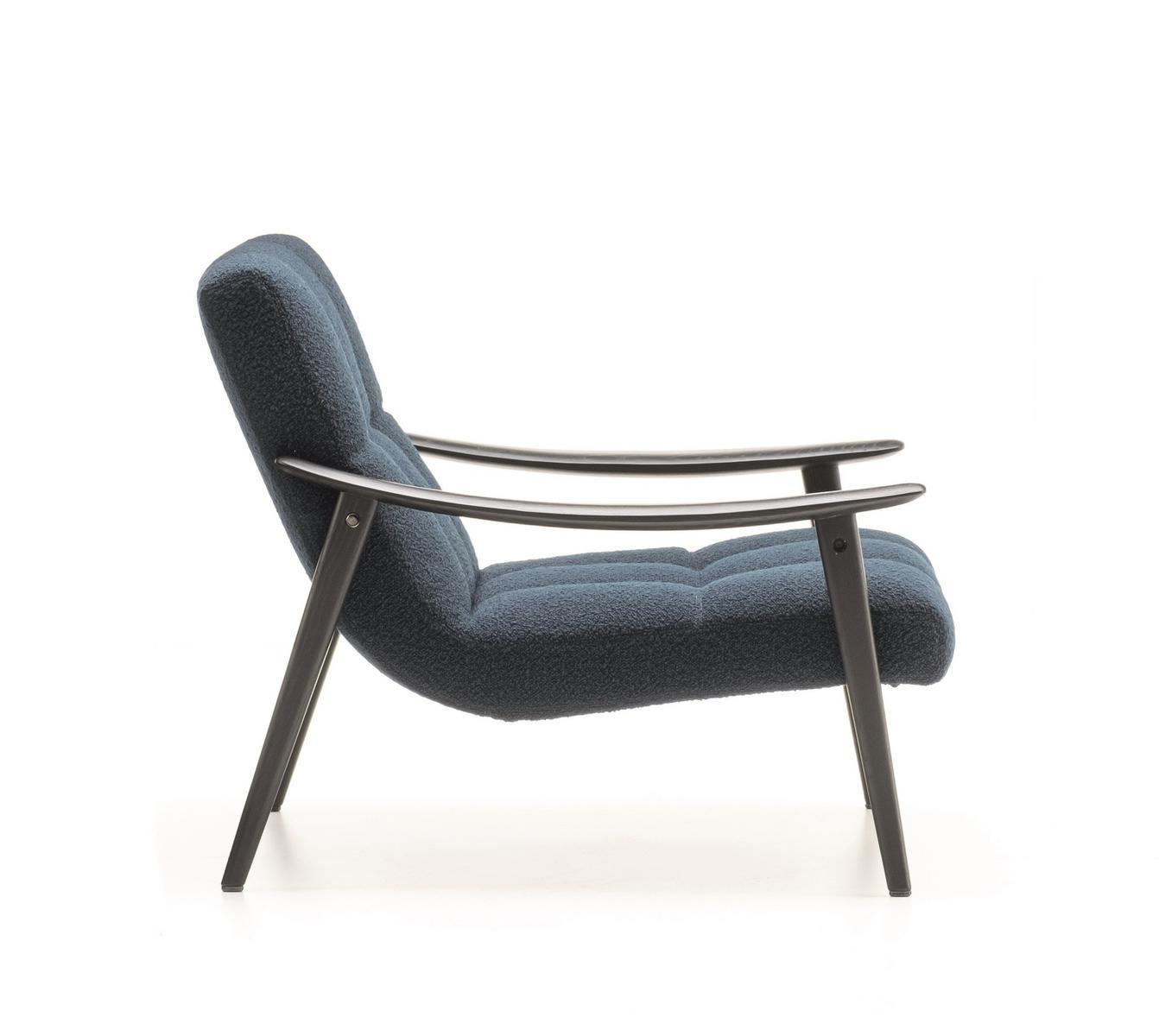 Upholstered armchair with armrests | Fynn by Minotti