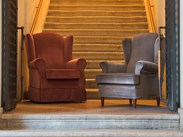 Upholstered fabric armchair with armrests | 202 by Domingo salotti