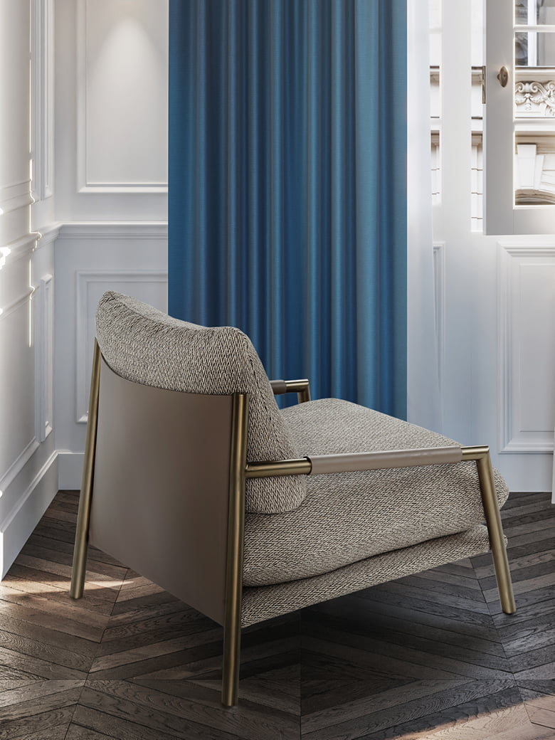 The Norman armchair offers a unique, forward-tilting design with a metal frame, regenerated leather upholstery, and a cushion-back for stylish, informal comfort. | Norman by Calia Italia