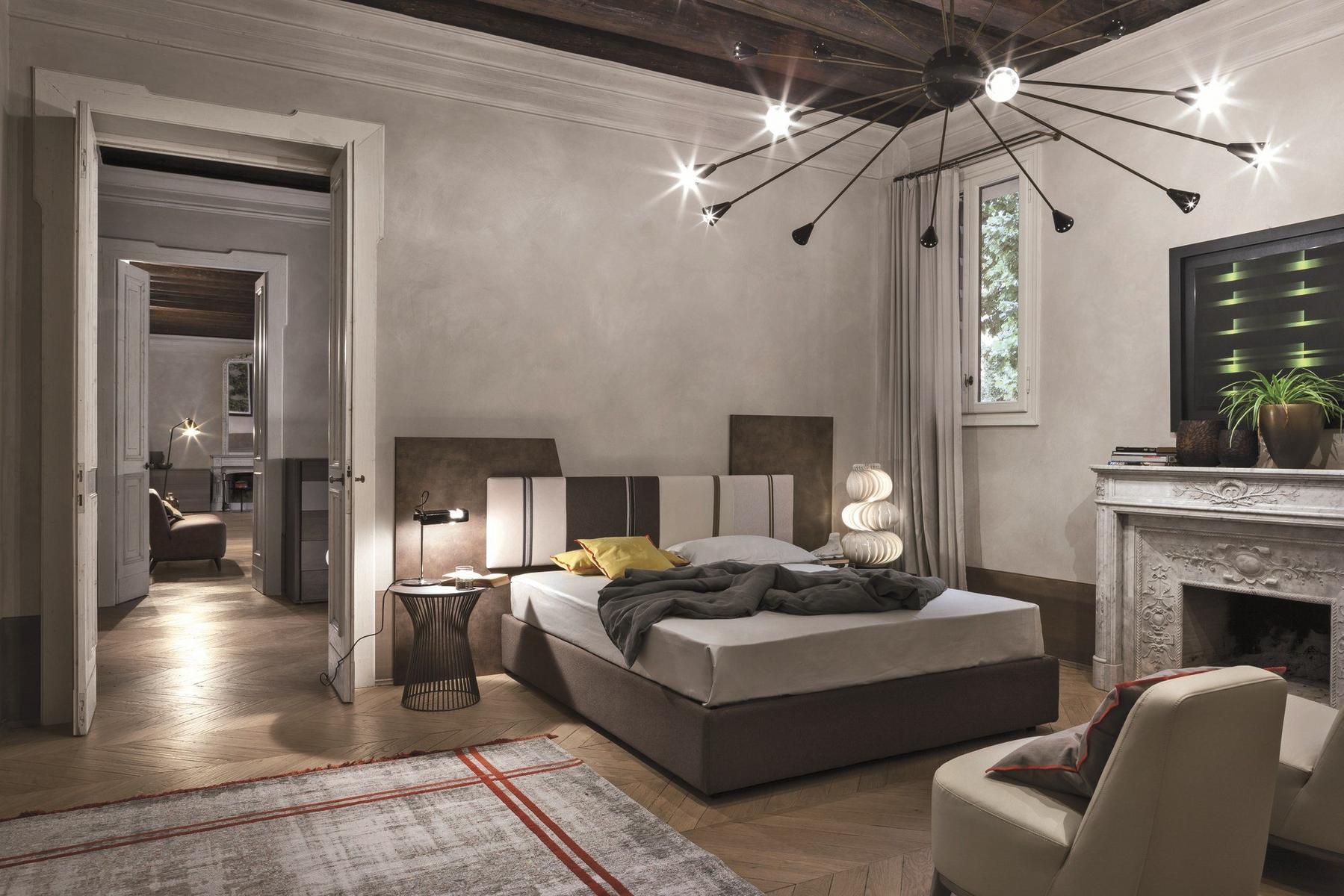 Storage bed with upholstered headboard | Diagonal by Tomasella