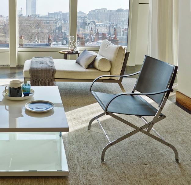 Folding leather chair with armrests | Carlotta by Flexform