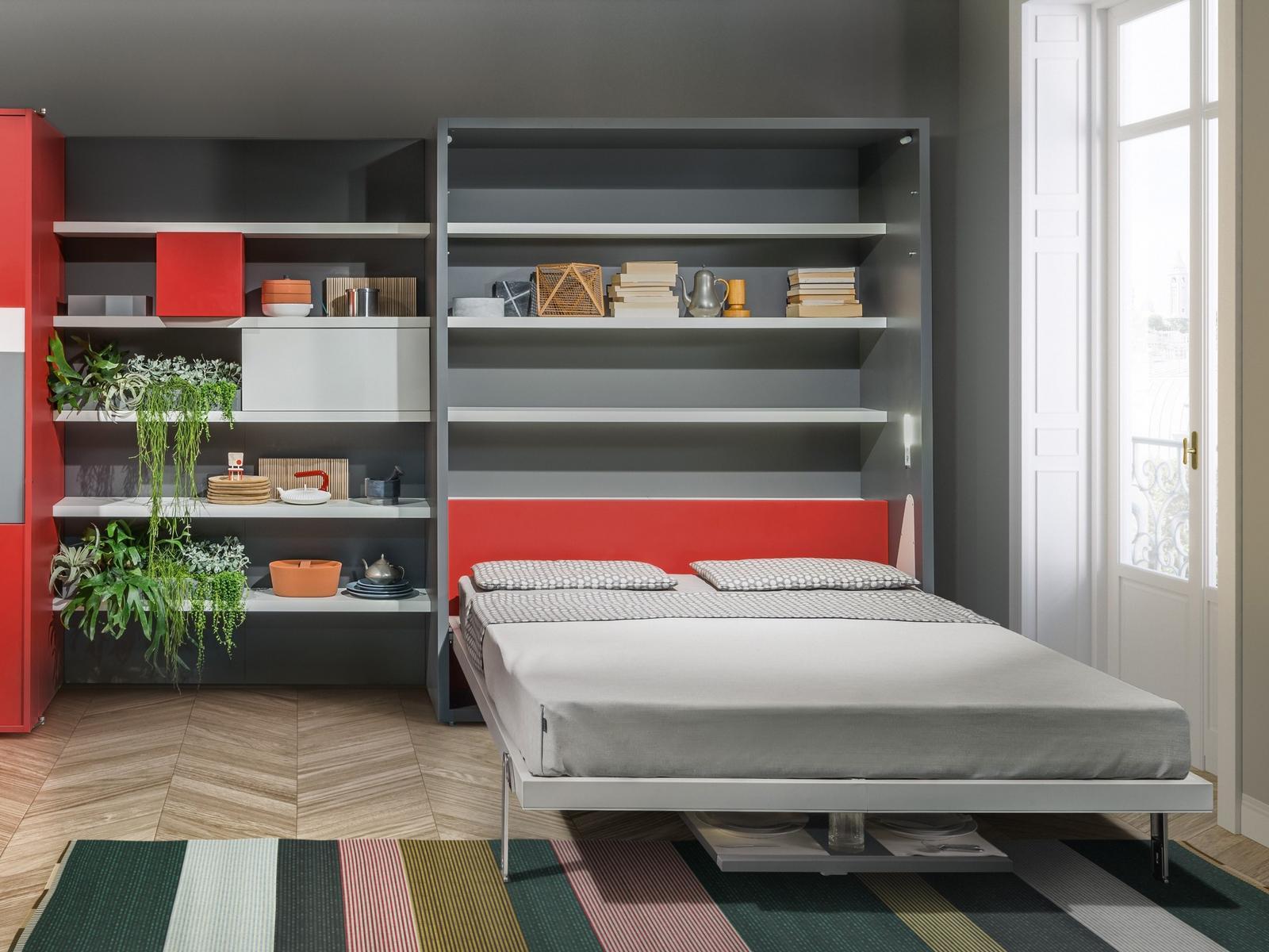 Storage wall with fold-away bed | Penelope 2 Dining by CLEI