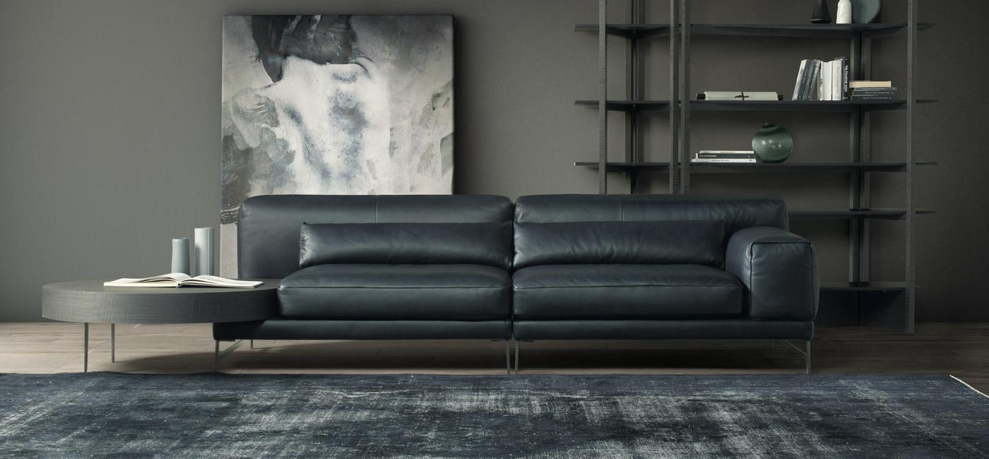 Leather sofa with integrated magazine rack | Ido by Natuzzi Italia