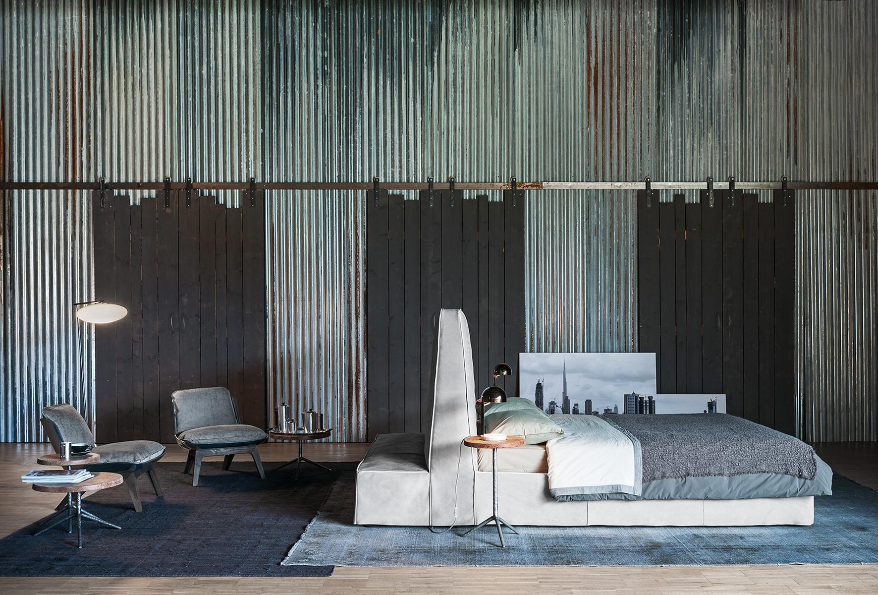 Leather bed with upholstered headboard |  by Baxter