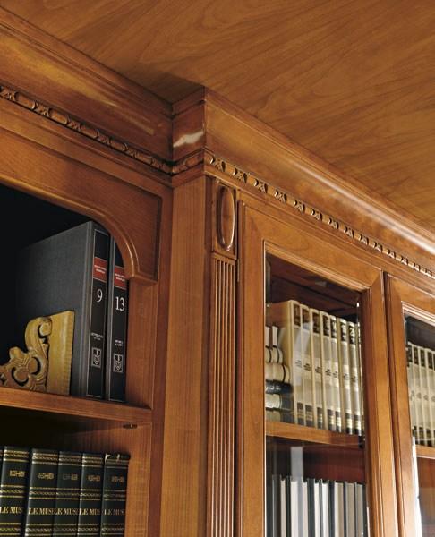 Wall-mounted custom cherry wood bookcase | Torino by Martini interiors