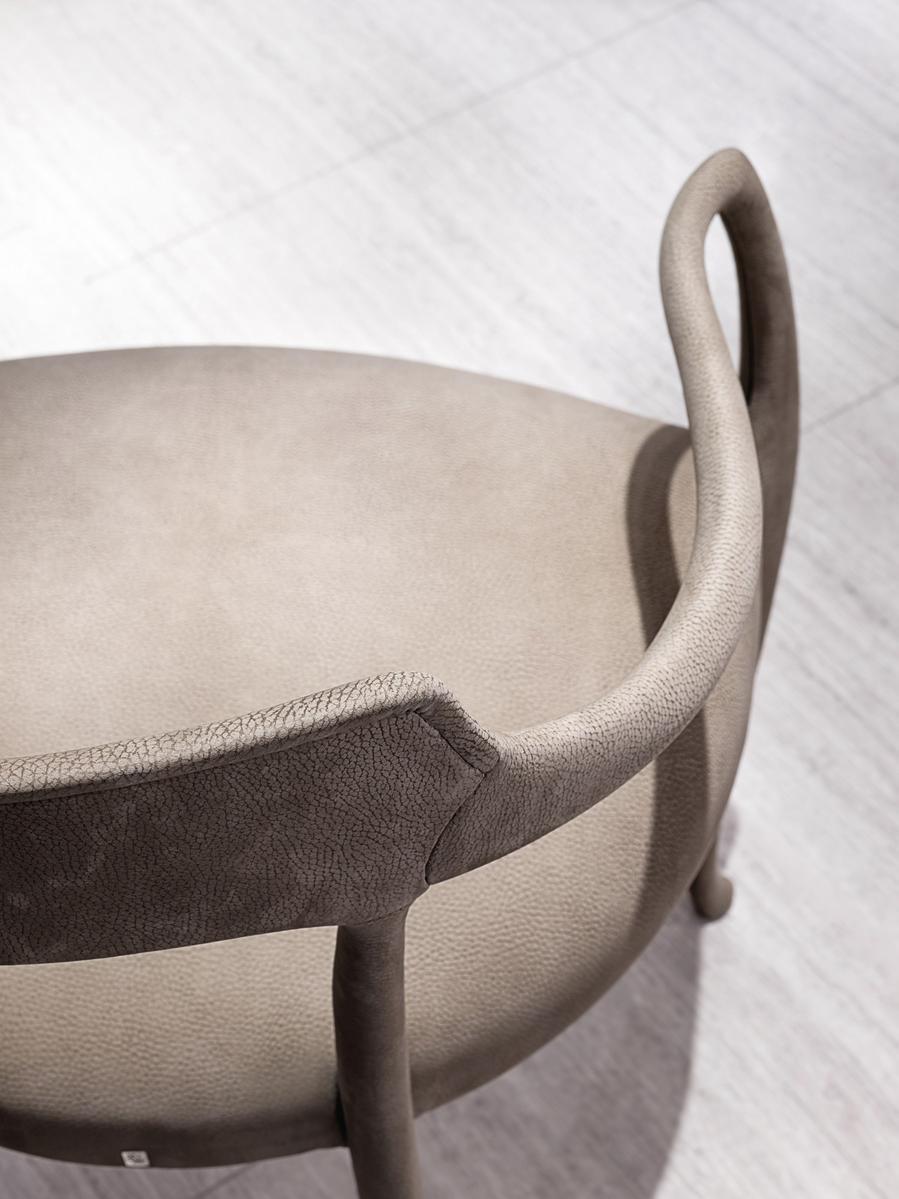 Upholstered leather chair with armrests | Rhea by Visionnair