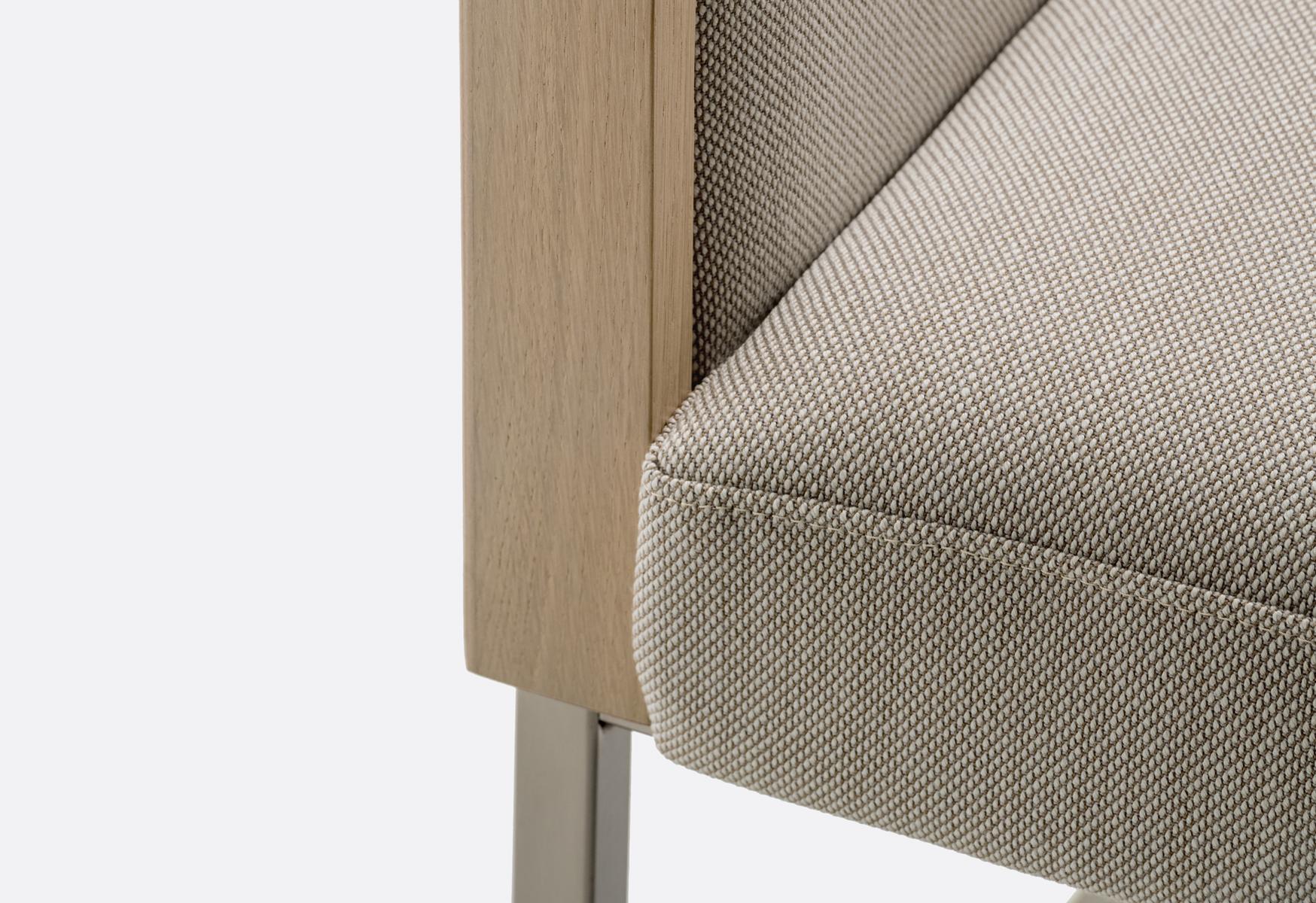 Sled base upholstered easy chair with armrests | Box 741 by Pedrali