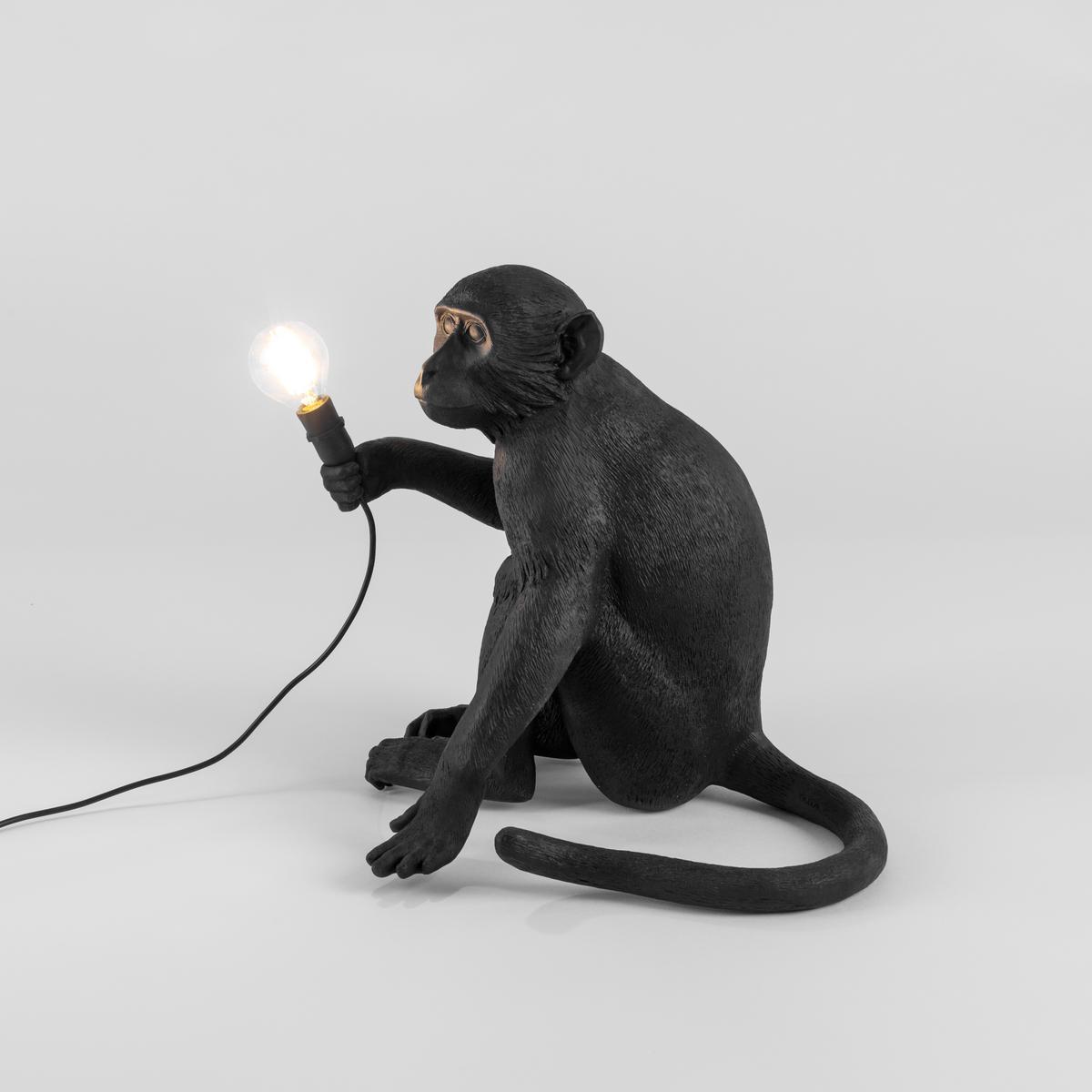LED resin floor lamp | The Monkey Lamp Black Sitting by Seletti
