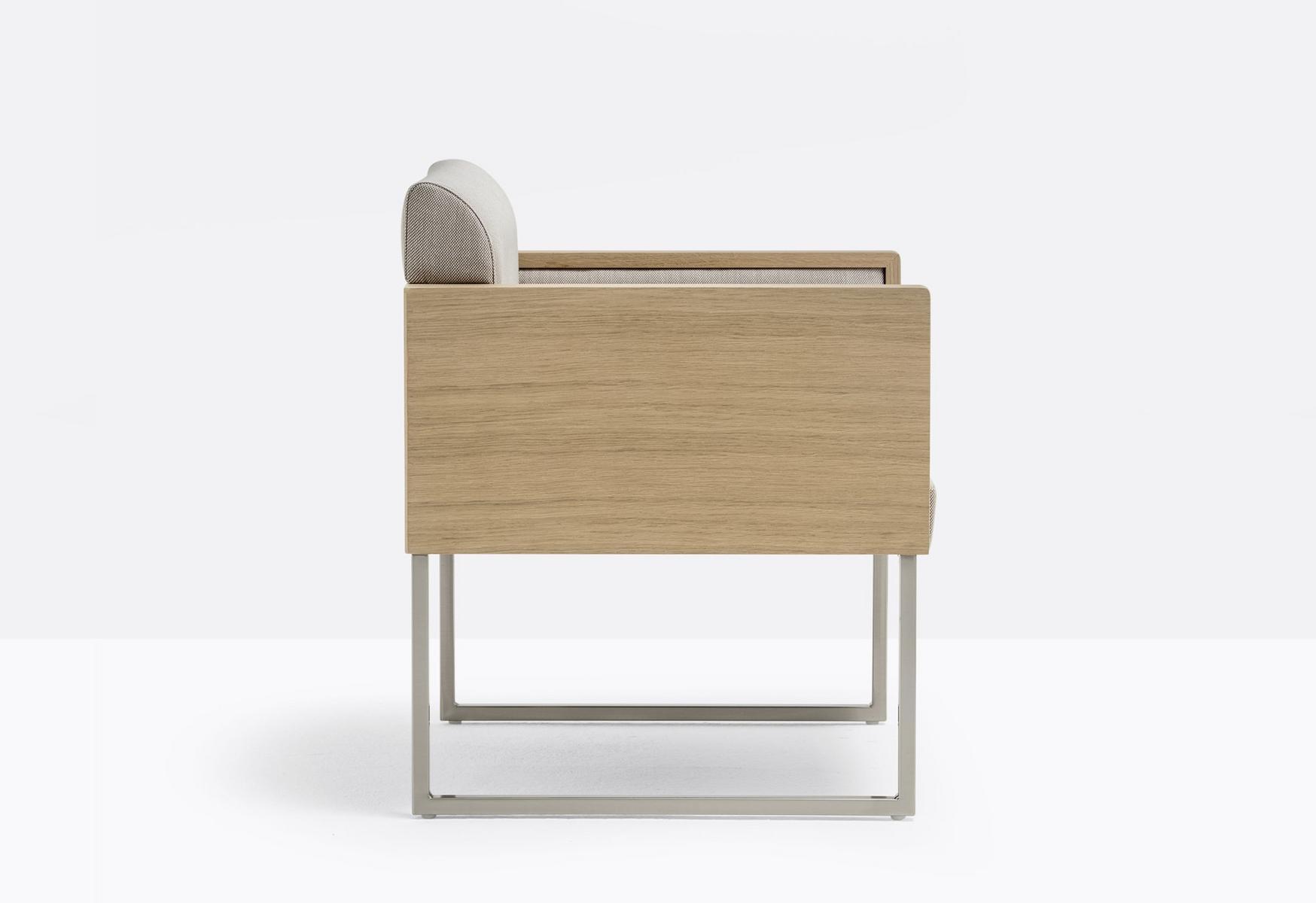 Sled base upholstered easy chair with armrests | Box 741 by Pedrali