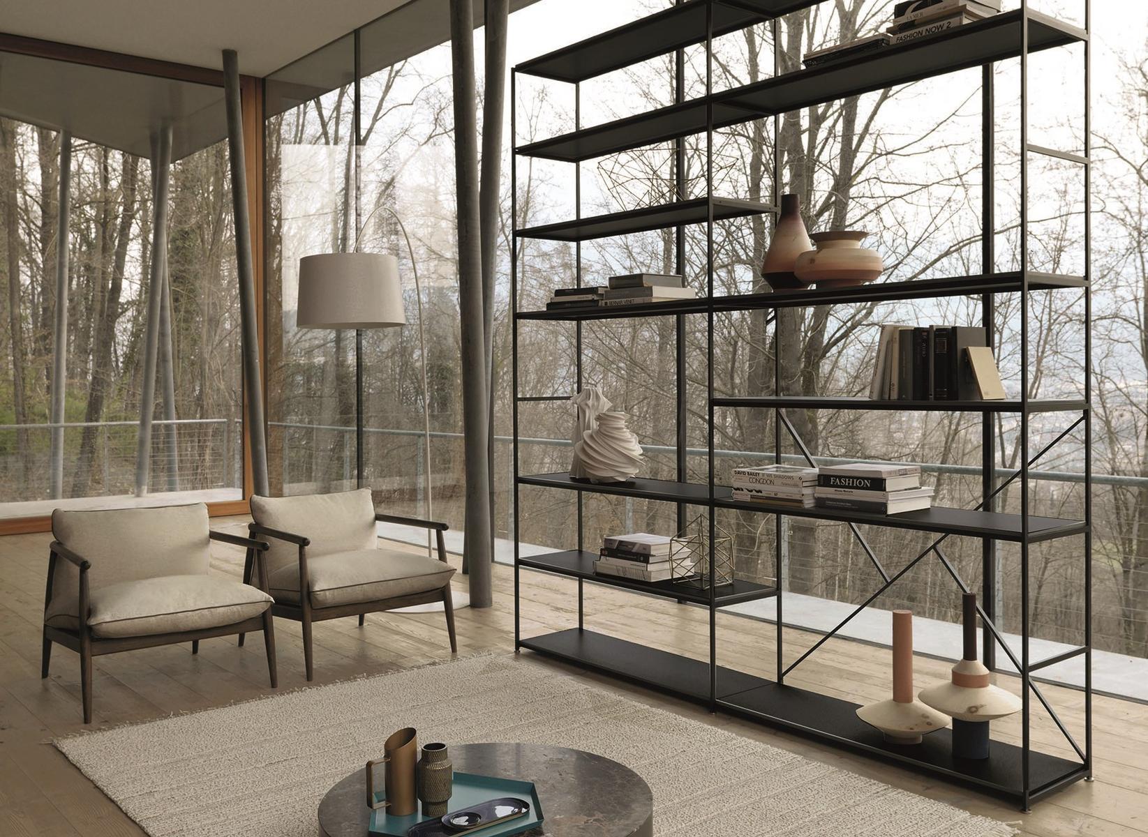 Open double-sided metal bookcase | Image by Desiree