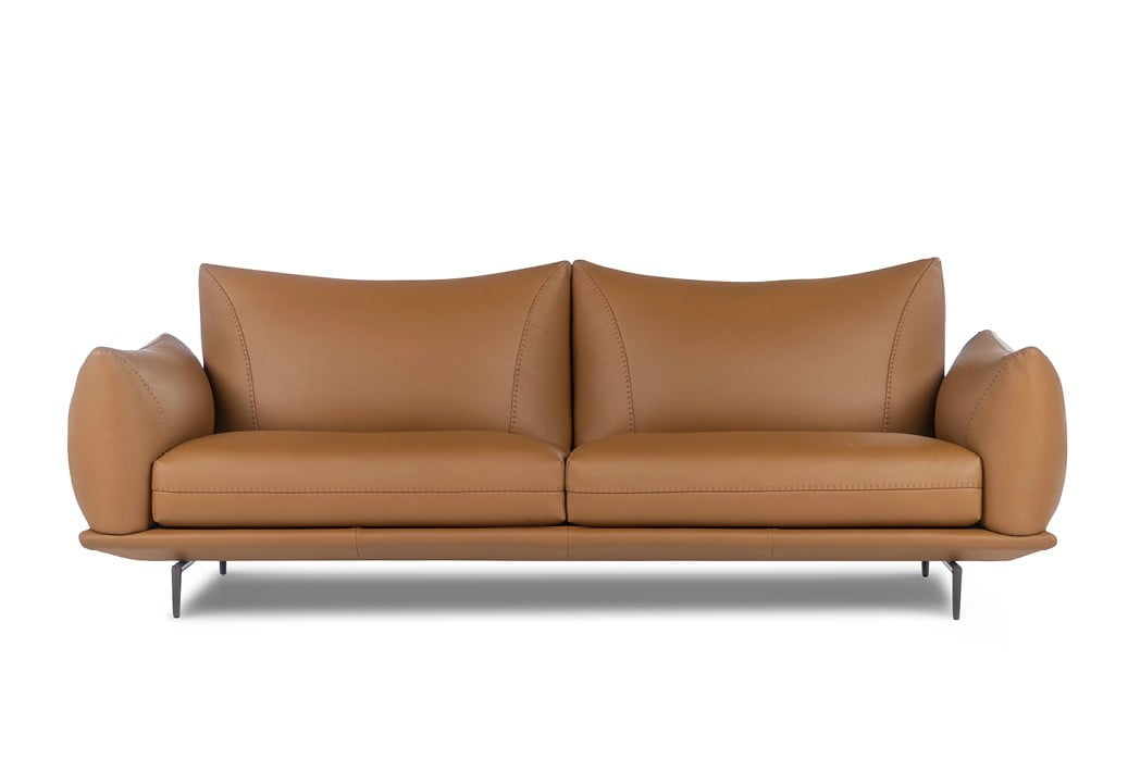 Elegant sectional with heightened backrests for superior comfort, minimal base, and decorative stitching, combining sophistication with supported relaxation. | Dragées by Calia Italia