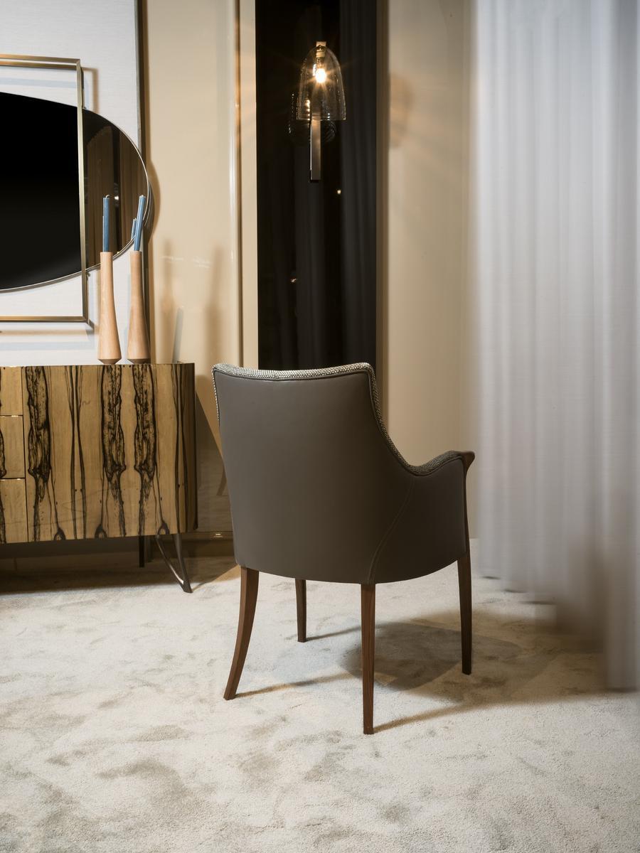 Upholstered fabric chair with armrests | Demetra by Ezio Bellotti