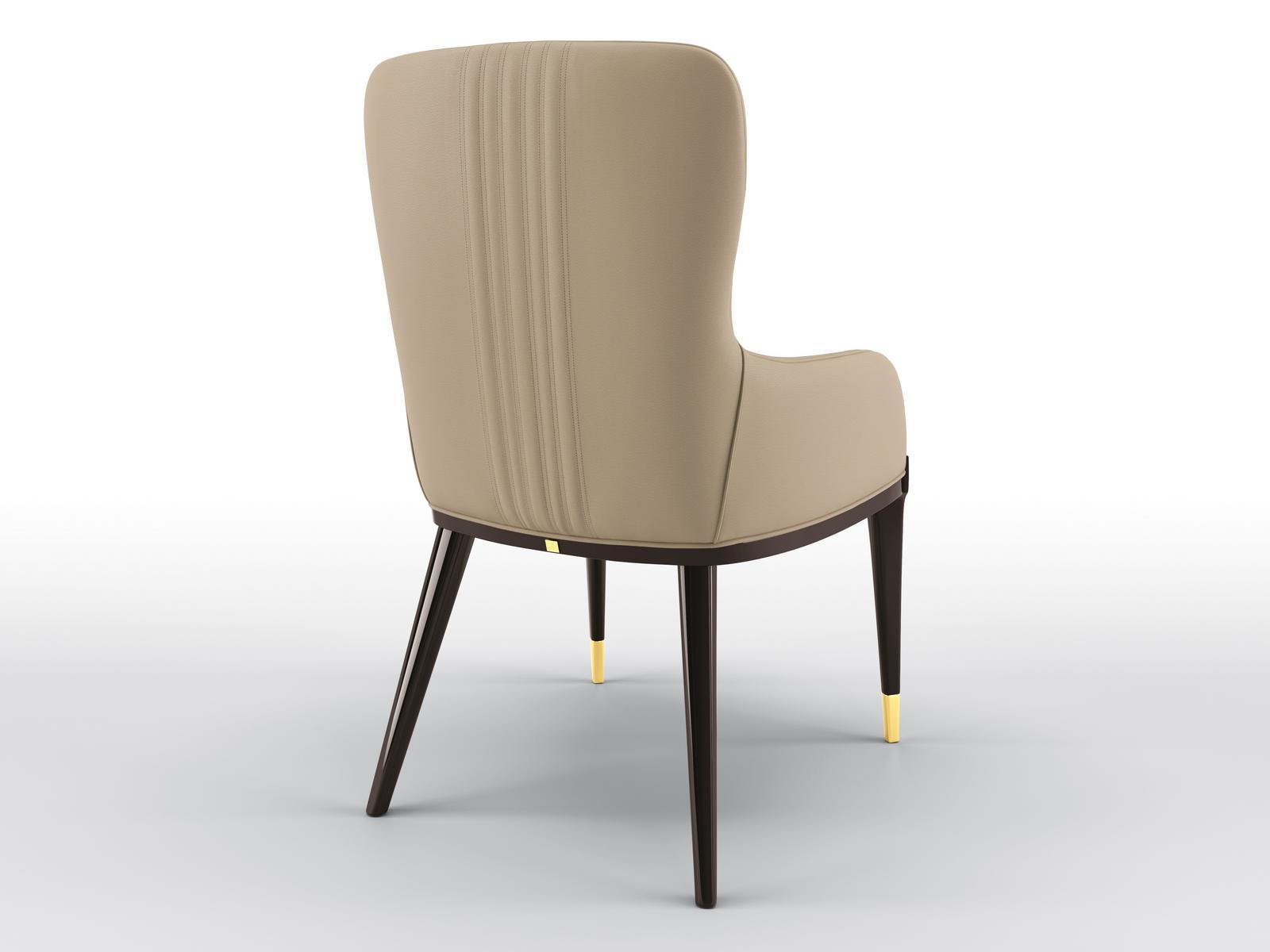 Upholstered leather chair with armrests | Celine by Bruno Zampa