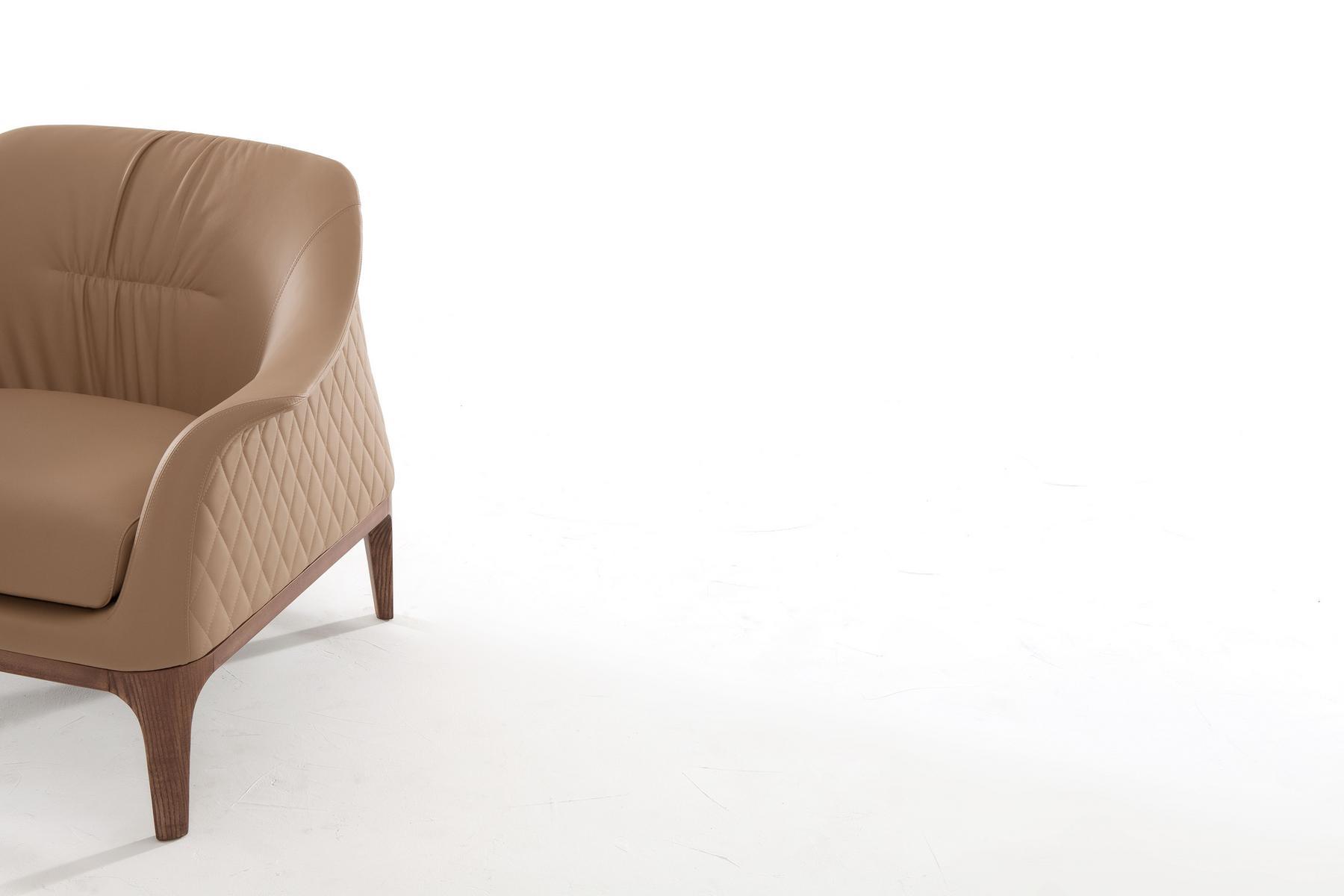 Upholstered leather armchair with armrests | Tiffany by Tonin Casa