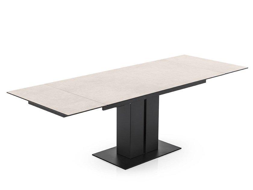 Extending ceramic table with weighted metal base | Pegaso by Connubia