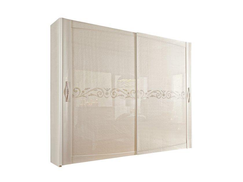 Built-in wooden wardrobe with sliding doors | Trend by Barnini Oseo