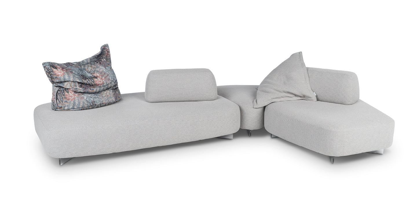 Modular sofa with moveable backrests and versatile configurations, providing flexible comfort and Italian-inspired design aesthetics for innovative living spaces. | Cremino by Calia Italia