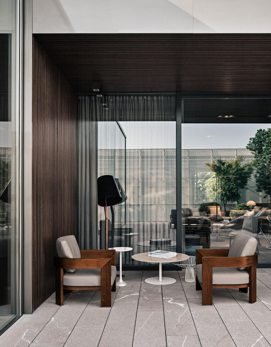 Outdoor armchair | Warhol Iroko Outdoor by Minotti